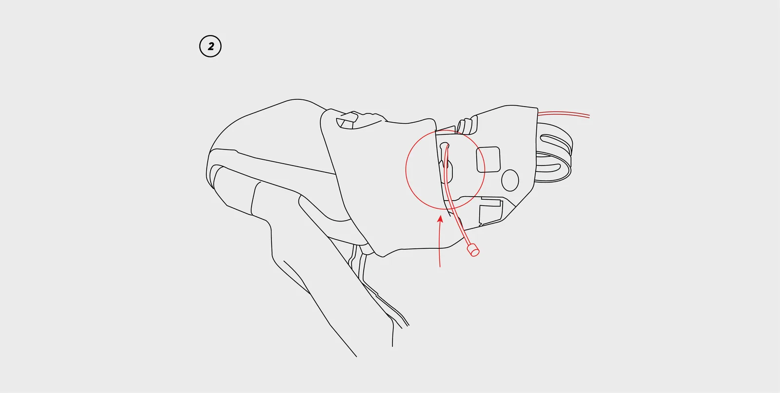 Threading the cable through the marked hole in the GRX lever.